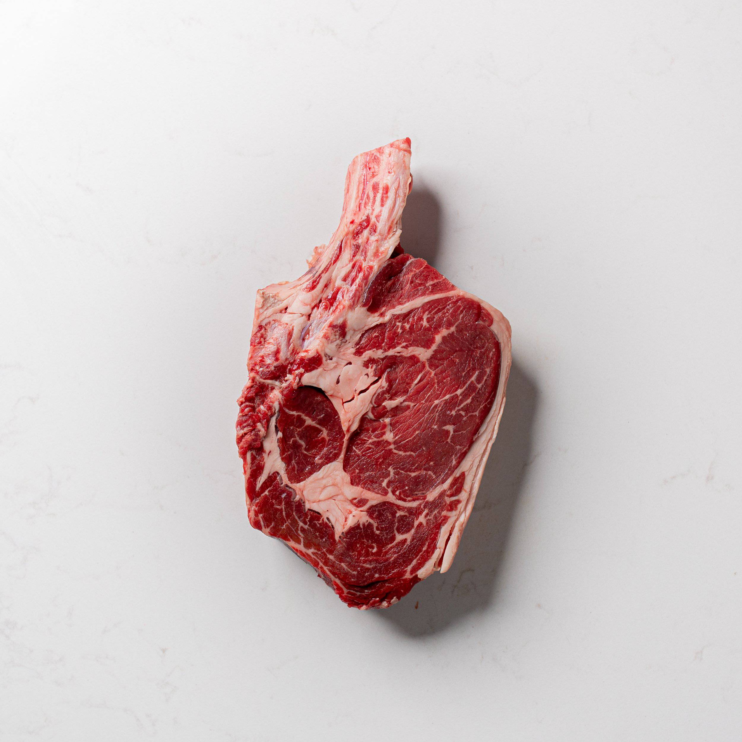 Local Natural Cowboy Steak Bone Frenched - Image 2